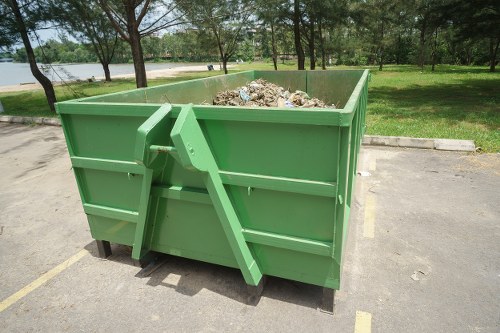 Segregated waste types and labeled skips for safe disposal